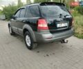 Черный Киа Соренто, объемом двигателя 2.5 л и пробегом 261 тыс. км за 4900 $, фото 2 на Automoto.ua