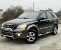 Черный Киа Соренто, объемом двигателя 2.5 л и пробегом 258 тыс. км за 5250 $, фото 1 на Automoto.ua