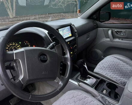 Черный Киа Соренто, объемом двигателя 2.5 л и пробегом 340 тыс. км за 7500 $, фото 8 на Automoto.ua