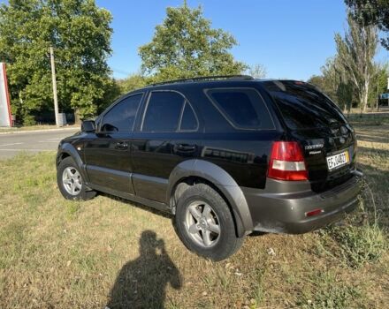 Черный Киа Соренто, объемом двигателя 2.5 л и пробегом 250 тыс. км за 4600 $, фото 4 на Automoto.ua