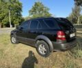 Черный Киа Соренто, объемом двигателя 2.5 л и пробегом 250 тыс. км за 4600 $, фото 4 на Automoto.ua