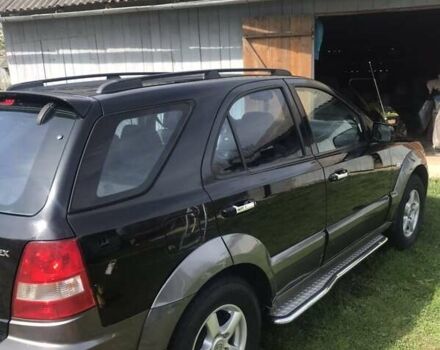 Черный Киа Соренто, объемом двигателя 2.5 л и пробегом 262 тыс. км за 9200 $, фото 40 на Automoto.ua