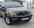 Черный Киа Соренто, объемом двигателя 2.5 л и пробегом 300 тыс. км за 8000 $, фото 1 на Automoto.ua