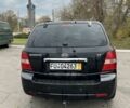 Черный Киа Соренто, объемом двигателя 2.5 л и пробегом 254 тыс. км за 3300 $, фото 3 на Automoto.ua