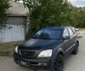 Черный Киа Соренто, объемом двигателя 2.5 л и пробегом 250 тыс. км за 3700 $, фото 1 на Automoto.ua