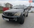 Черный Киа Соренто, объемом двигателя 2.5 л и пробегом 300 тыс. км за 8000 $, фото 1 на Automoto.ua