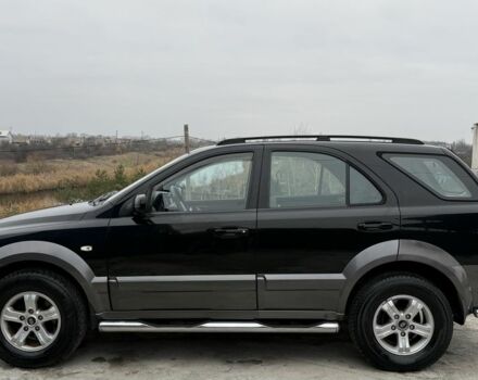 Черный Киа Соренто, объемом двигателя 2.5 л и пробегом 258 тыс. км за 5250 $, фото 2 на Automoto.ua