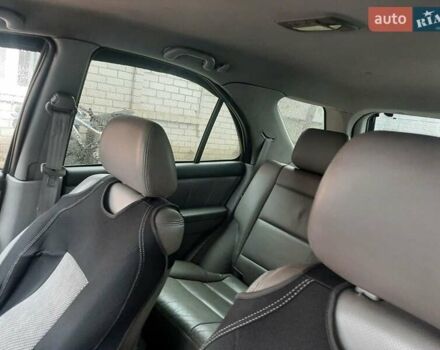 Черный Киа Соренто, объемом двигателя 2.5 л и пробегом 220 тыс. км за 4500 $, фото 9 на Automoto.ua