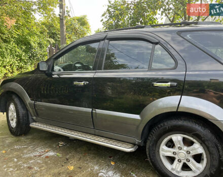 Черный Киа Соренто, объемом двигателя 2.4 л и пробегом 205 тыс. км за 7000 $, фото 1 на Automoto.ua