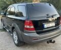 Чорний Кіа Соренто, об'ємом двигуна 2.5 л та пробігом 370 тис. км за 4850 $, фото 4 на Automoto.ua