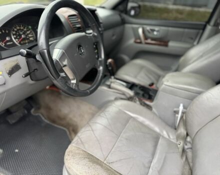 Черный Киа Соренто, объемом двигателя 2.5 л и пробегом 285 тыс. км за 3000 $, фото 4 на Automoto.ua