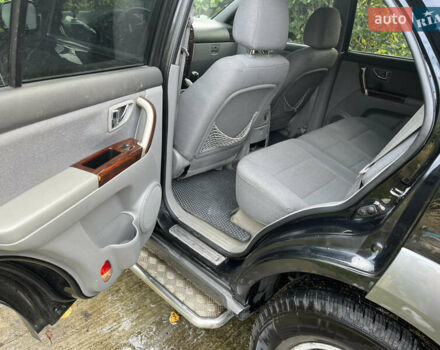 Черный Киа Соренто, объемом двигателя 2.4 л и пробегом 205 тыс. км за 7000 $, фото 13 на Automoto.ua