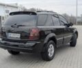 Черный Киа Соренто, объемом двигателя 2.5 л и пробегом 300 тыс. км за 8000 $, фото 4 на Automoto.ua