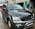 Черный Киа Соренто, объемом двигателя 2.5 л и пробегом 350 тыс. км за 7300 $, фото 1 на Automoto.ua