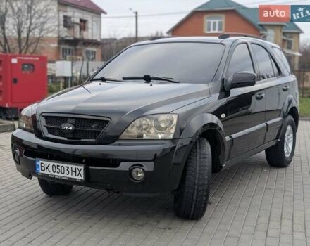 Черный Киа Соренто, объемом двигателя 2.5 л и пробегом 300 тыс. км за 8000 $, фото 1 на Automoto.ua
