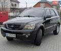 Черный Киа Соренто, объемом двигателя 2.5 л и пробегом 300 тыс. км за 8000 $, фото 1 на Automoto.ua