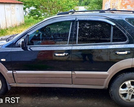 Черный Киа Соренто, объемом двигателя 2.5 л и пробегом 350 тыс. км за 4000 $, фото 5 на Automoto.ua