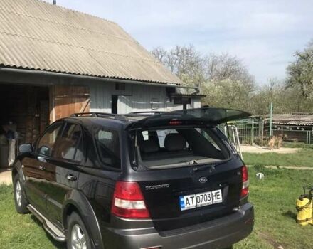 Черный Киа Соренто, объемом двигателя 2.5 л и пробегом 262 тыс. км за 9200 $, фото 46 на Automoto.ua