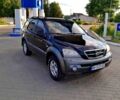 Чорний Кіа Соренто, об'ємом двигуна 2.5 л та пробігом 320 тис. км за 5700 $, фото 1 на Automoto.ua