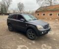 Черный Киа Соренто, объемом двигателя 2.5 л и пробегом 380 тыс. км за 5000 $, фото 1 на Automoto.ua
