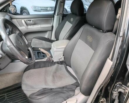 Черный Киа Соренто, объемом двигателя 2.4 л и пробегом 300 тыс. км за 6490 $, фото 15 на Automoto.ua