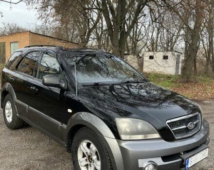 Черный Киа Соренто, объемом двигателя 2.5 л и пробегом 244 тыс. км за 4750 $, фото 1 на Automoto.ua