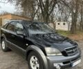 Черный Киа Соренто, объемом двигателя 2.5 л и пробегом 244 тыс. км за 4750 $, фото 1 на Automoto.ua