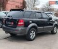 Чорний Кіа Соренто, об'ємом двигуна 2.4 л та пробігом 300 тис. км за 6480 $, фото 7 на Automoto.ua