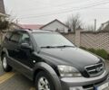 Черный Киа Соренто, объемом двигателя 2.5 л и пробегом 250 тыс. км за 4750 $, фото 1 на Automoto.ua