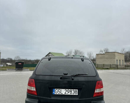 Черный Киа Соренто, объемом двигателя 2.5 л и пробегом 280 тыс. км за 3700 $, фото 4 на Automoto.ua