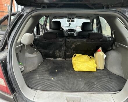 Черный Киа Соренто, объемом двигателя 2.5 л и пробегом 327 тыс. км за 6200 $, фото 7 на Automoto.ua