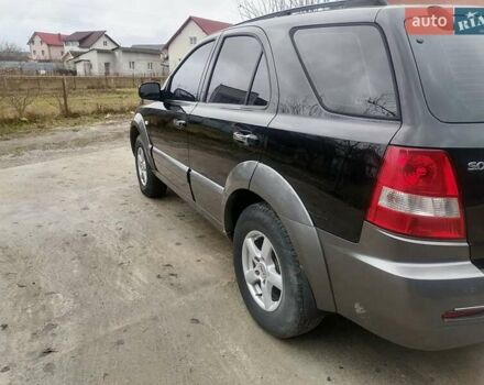Чорний Кіа Соренто, об'ємом двигуна 2.5 л та пробігом 294 тис. км за 7400 $, фото 6 на Automoto.ua