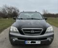 Черный Киа Соренто, объемом двигателя 2.5 л и пробегом 280 тыс. км за 4300 $, фото 1 на Automoto.ua