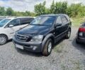 Черный Киа Соренто, объемом двигателя 2.5 л и пробегом 247 тыс. км за 5800 $, фото 1 на Automoto.ua