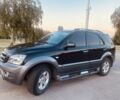Черный Киа Соренто, объемом двигателя 2.5 л и пробегом 119 тыс. км за 8800 $, фото 3 на Automoto.ua