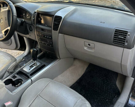 Черный Киа Соренто, объемом двигателя 2.5 л и пробегом 192 тыс. км за 6500 $, фото 12 на Automoto.ua