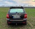 Черный Киа Соренто, объемом двигателя 2.5 л и пробегом 300 тыс. км за 6000 $, фото 5 на Automoto.ua