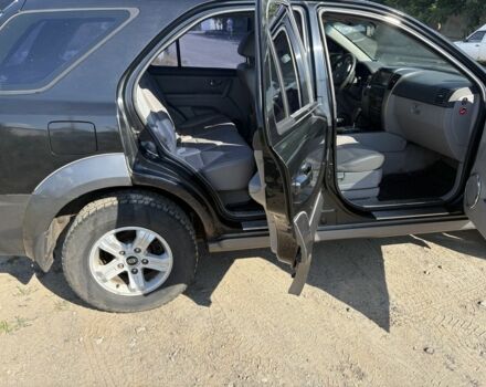 Черный Киа Соренто, объемом двигателя 2.5 л и пробегом 330 тыс. км за 3722 $, фото 9 на Automoto.ua