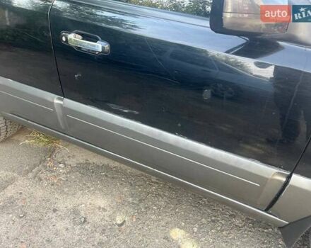 Черный Киа Соренто, объемом двигателя 2.5 л и пробегом 215 тыс. км за 8500 $, фото 6 на Automoto.ua