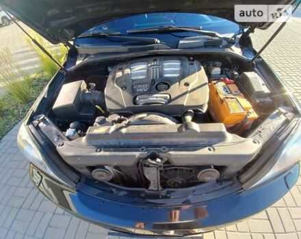 Чорний Кіа Соренто, об'ємом двигуна 2.5 л та пробігом 310 тис. км за 9000 $, фото 2 на Automoto.ua