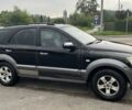 Черный Киа Соренто, объемом двигателя 2.5 л и пробегом 256 тыс. км за 3500 $, фото 2 на Automoto.ua
