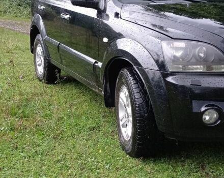 Черный Киа Соренто, объемом двигателя 2.5 л и пробегом 286 тыс. км за 6600 $, фото 4 на Automoto.ua