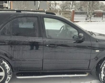 Черный Киа Соренто, объемом двигателя 2.5 л и пробегом 217 тыс. км за 3400 $, фото 4 на Automoto.ua