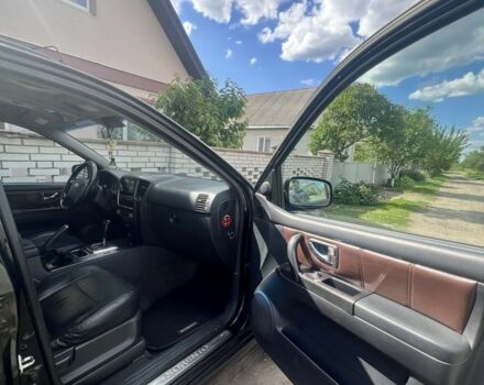 Черный Киа Соренто, объемом двигателя 2.5 л и пробегом 280 тыс. км за 4499 $, фото 8 на Automoto.ua