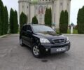 Чорний Кіа Соренто, об'ємом двигуна 2 л та пробігом 307 тис. км за 3899 $, фото 1 на Automoto.ua