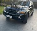 Черный Киа Соренто, объемом двигателя 2.5 л и пробегом 255 тыс. км за 8600 $, фото 2 на Automoto.ua
