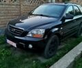 Чорний Кіа Соренто, об'ємом двигуна 3.5 л та пробігом 295 тис. км за 5250 $, фото 1 на Automoto.ua