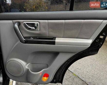 Чорний Кіа Соренто, об'ємом двигуна 2.5 л та пробігом 226 тис. км за 8490 $, фото 27 на Automoto.ua