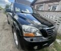 Черный Киа Соренто, объемом двигателя 2.5 л и пробегом 280 тыс. км за 4500 $, фото 6 на Automoto.ua