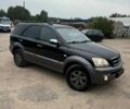 Черный Киа Соренто, объемом двигателя 2.5 л и пробегом 240 тыс. км за 5600 $, фото 1 на Automoto.ua